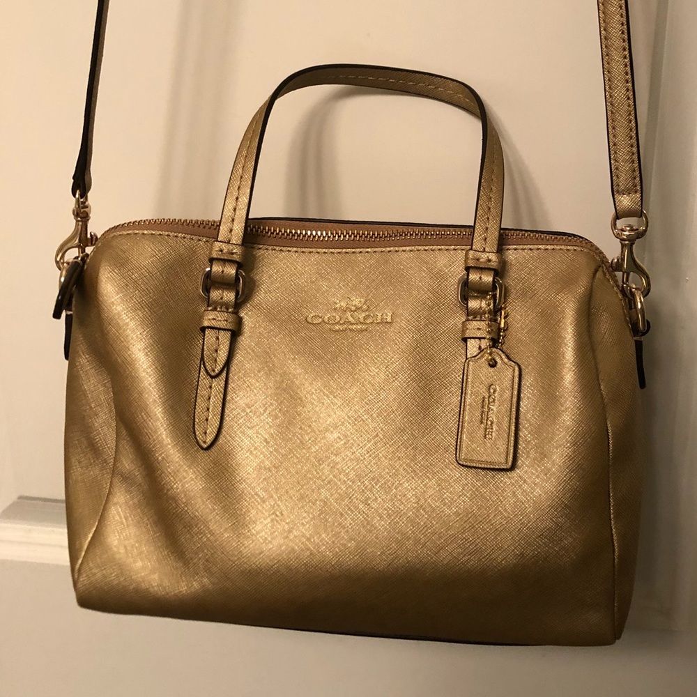 Gold colored Coach bag